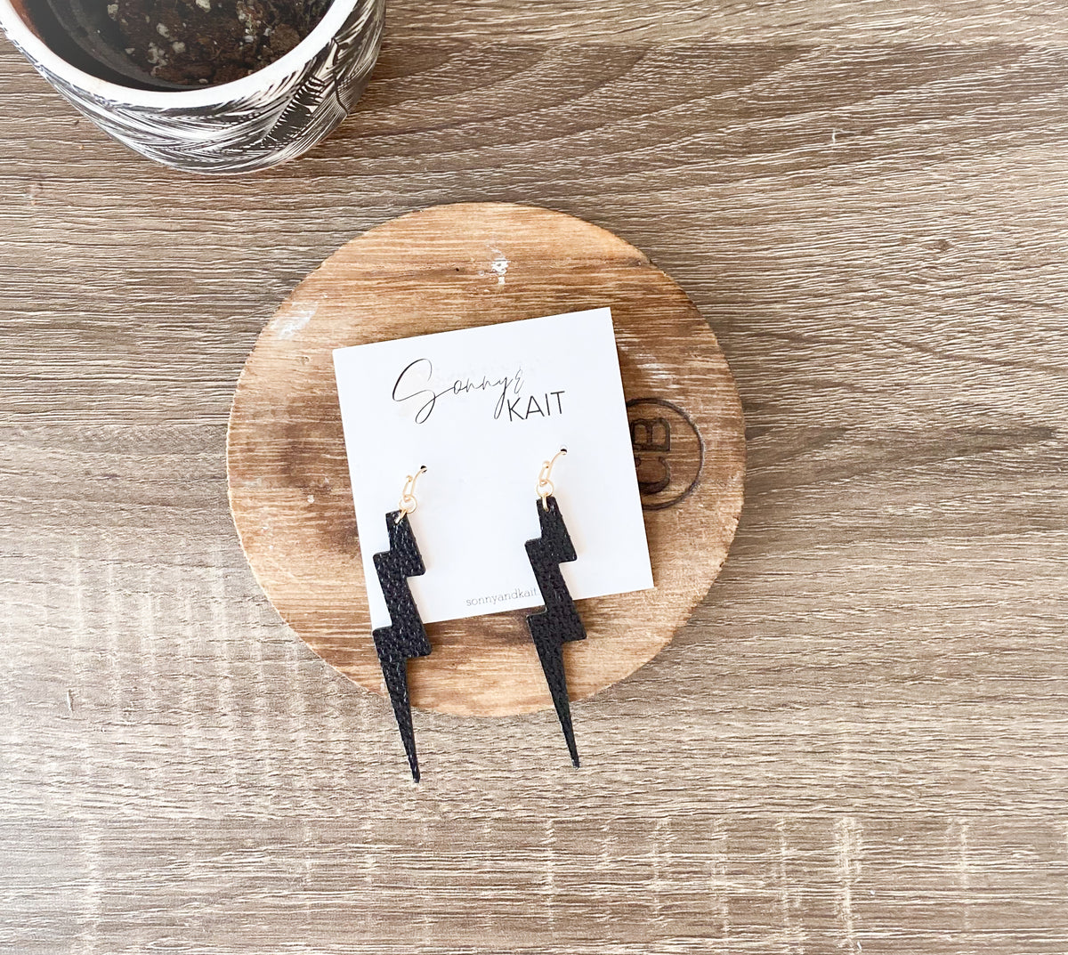 BLACK FAUX LEATHER BOLT EARRINGS